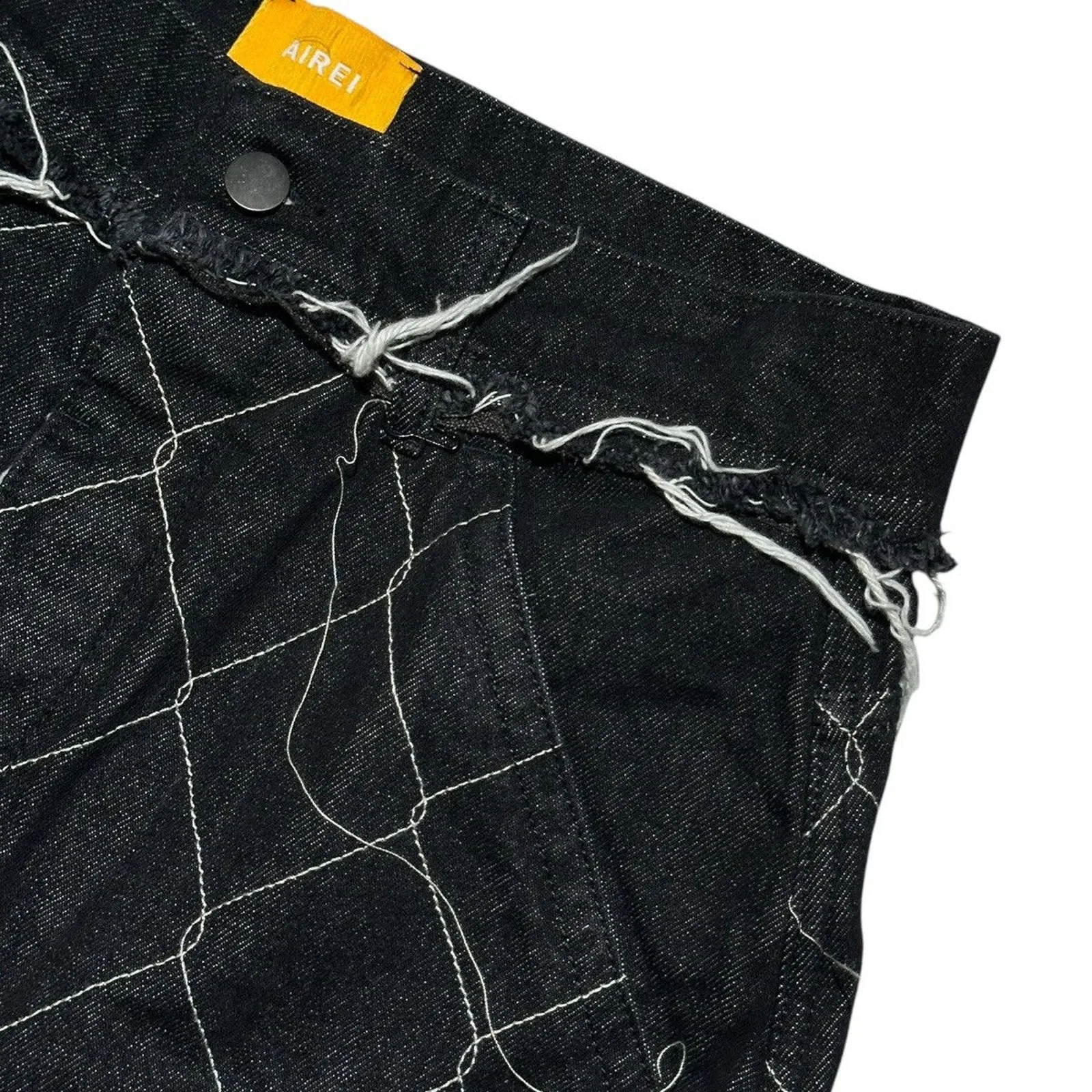 Exposed chain link stitch denim